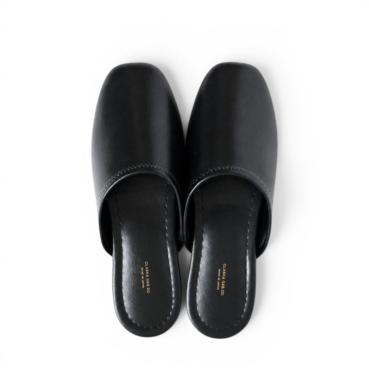 hibino black synthetic leather Japanese-style unisex slippers with a minimalist design and square toe.