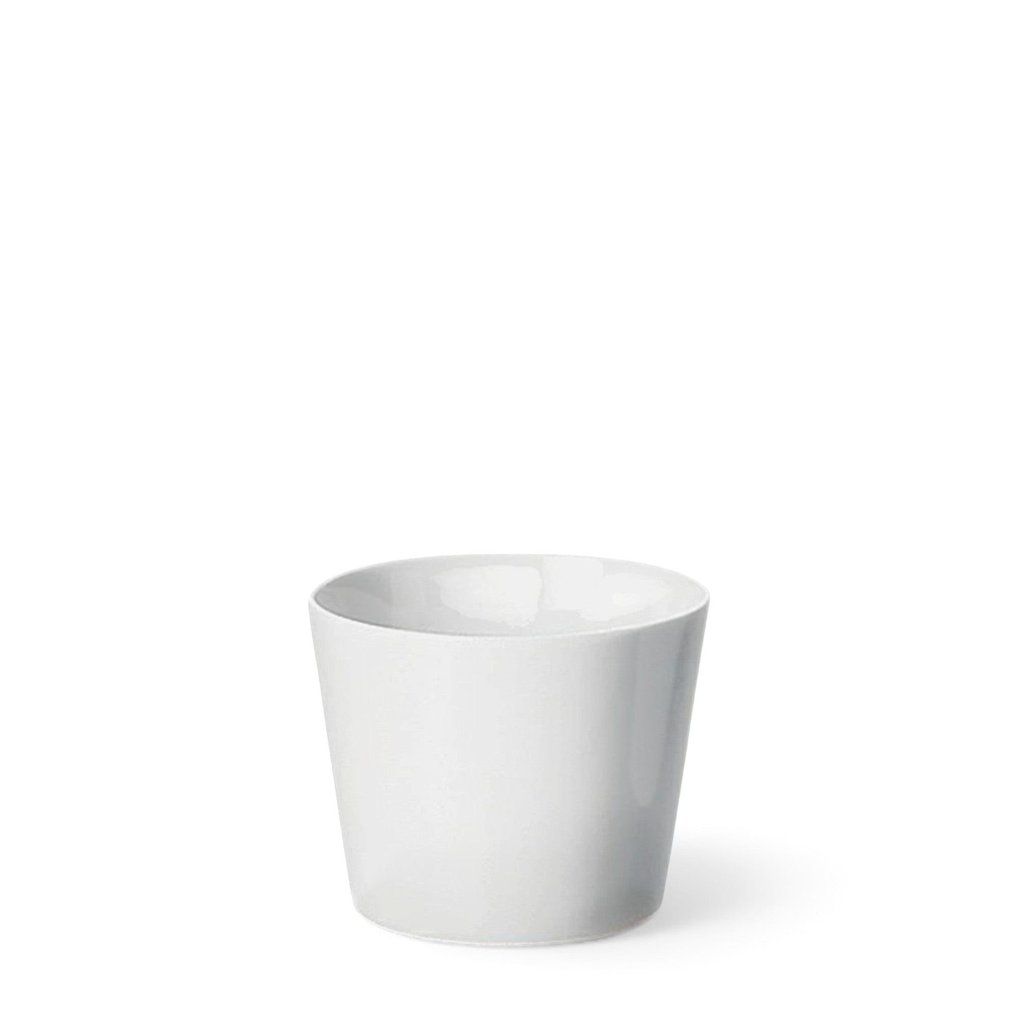 hibino Blanco white porcelain cup with a clear glaze, handcrafted in Japan for a minimalist and stable design.