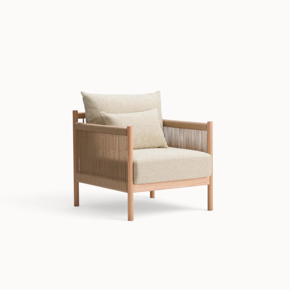 hibino Braid lounge chair with light beige fabric cushions, wooden frame, and woven paper cord armrests