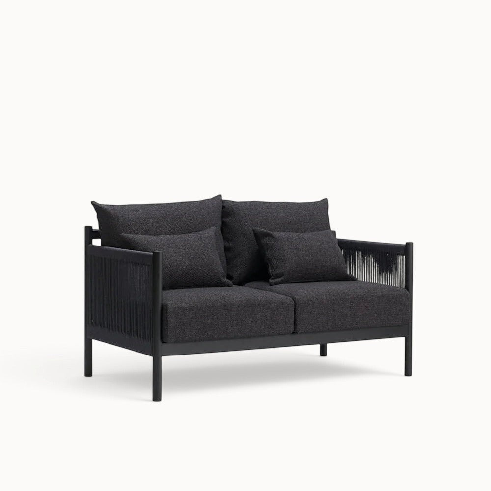 hibino Braid Sofa in dark grey fabric with black woven paper cord armrests and a minimalist wooden frame
