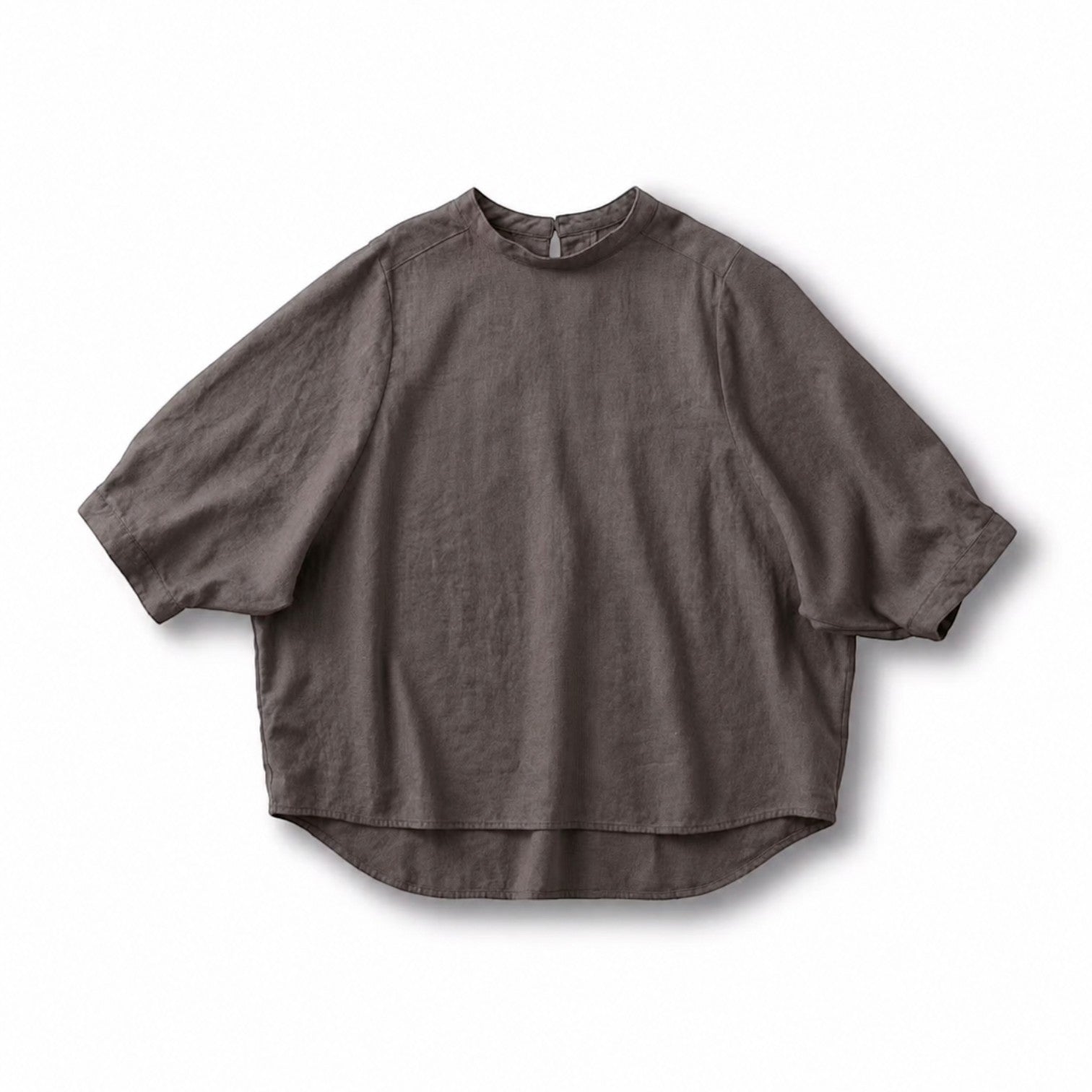 hibino brown cotton-linen blend dolman sleeve top with a high neckline and relaxed, draped silhouette.