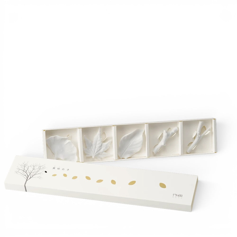 hibino ceramic chopstick rest set featuring white leaf and branch designs in a decorative gift box