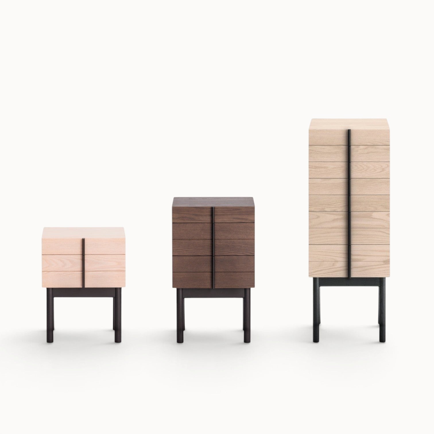 hibino Column Chest set featuring three wooden drawer units with vertical dovetail handles on black metal legs.