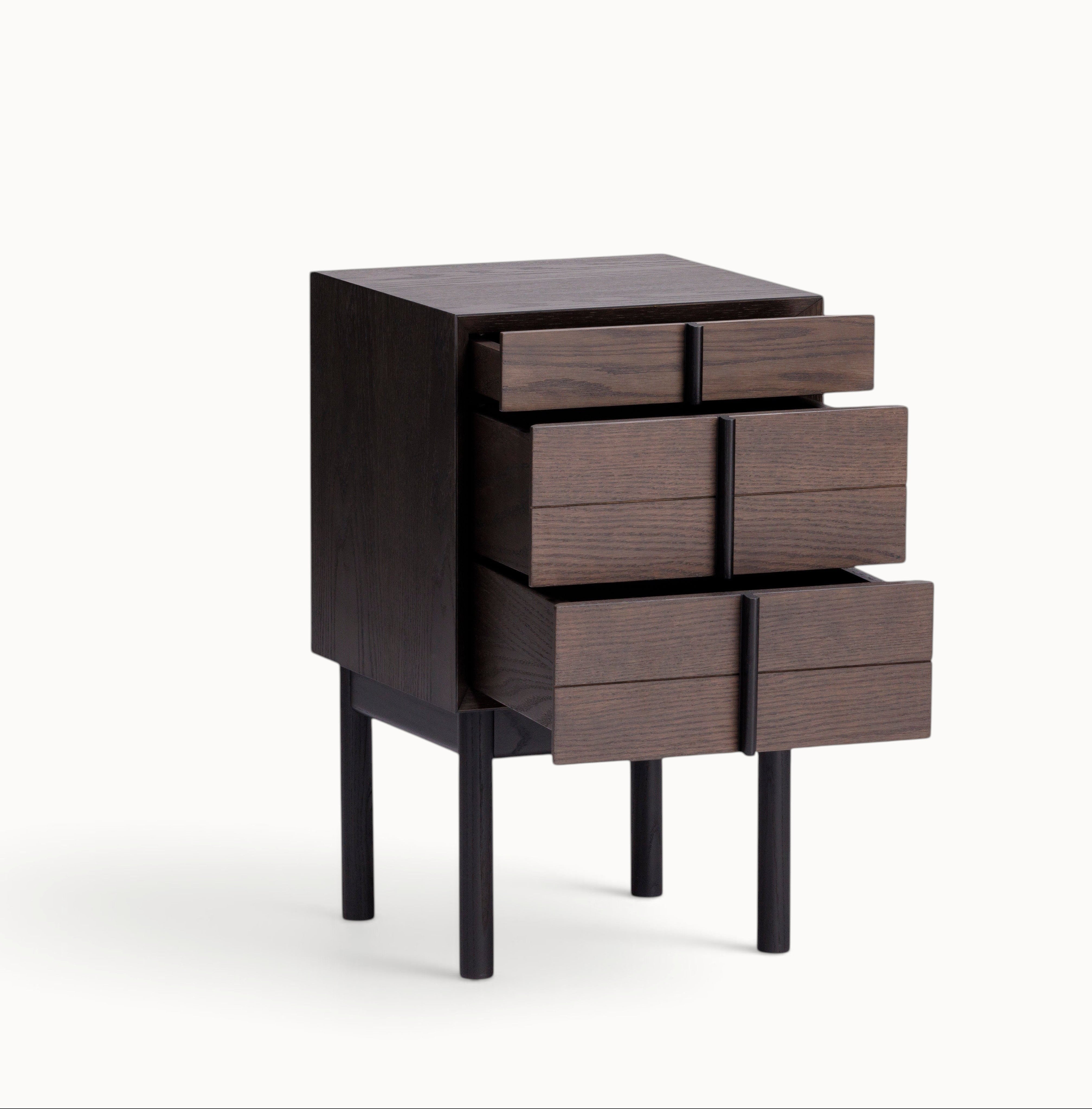 hibino Column Night Table in dark stained wood with dovetail joint handles forming a vertical line on open drawers