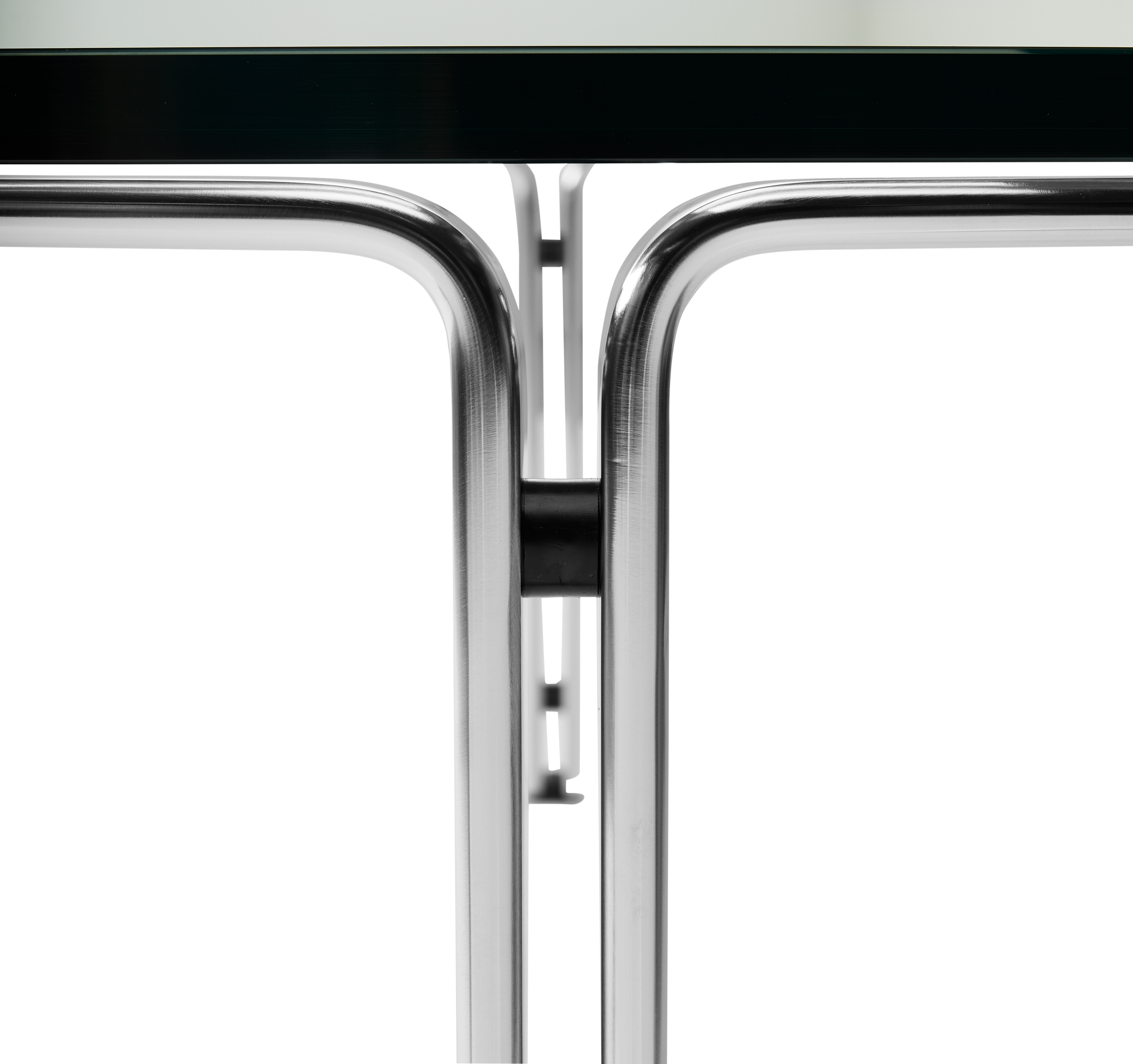 hibino FK110 coffee table featuring a minimalist chrome steel frame and a glass top with architectural design