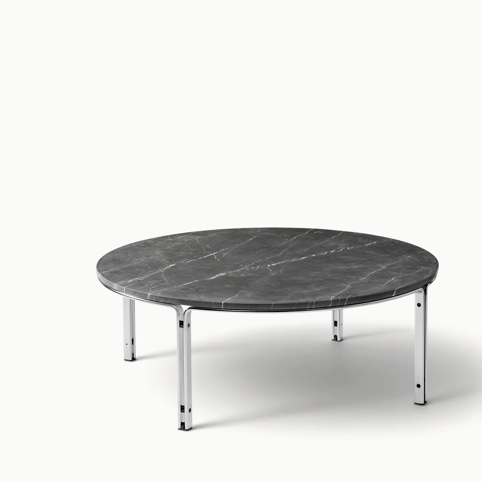 hibino FK110 round coffee table with a dark grey marble top and a minimalist polished steel frame