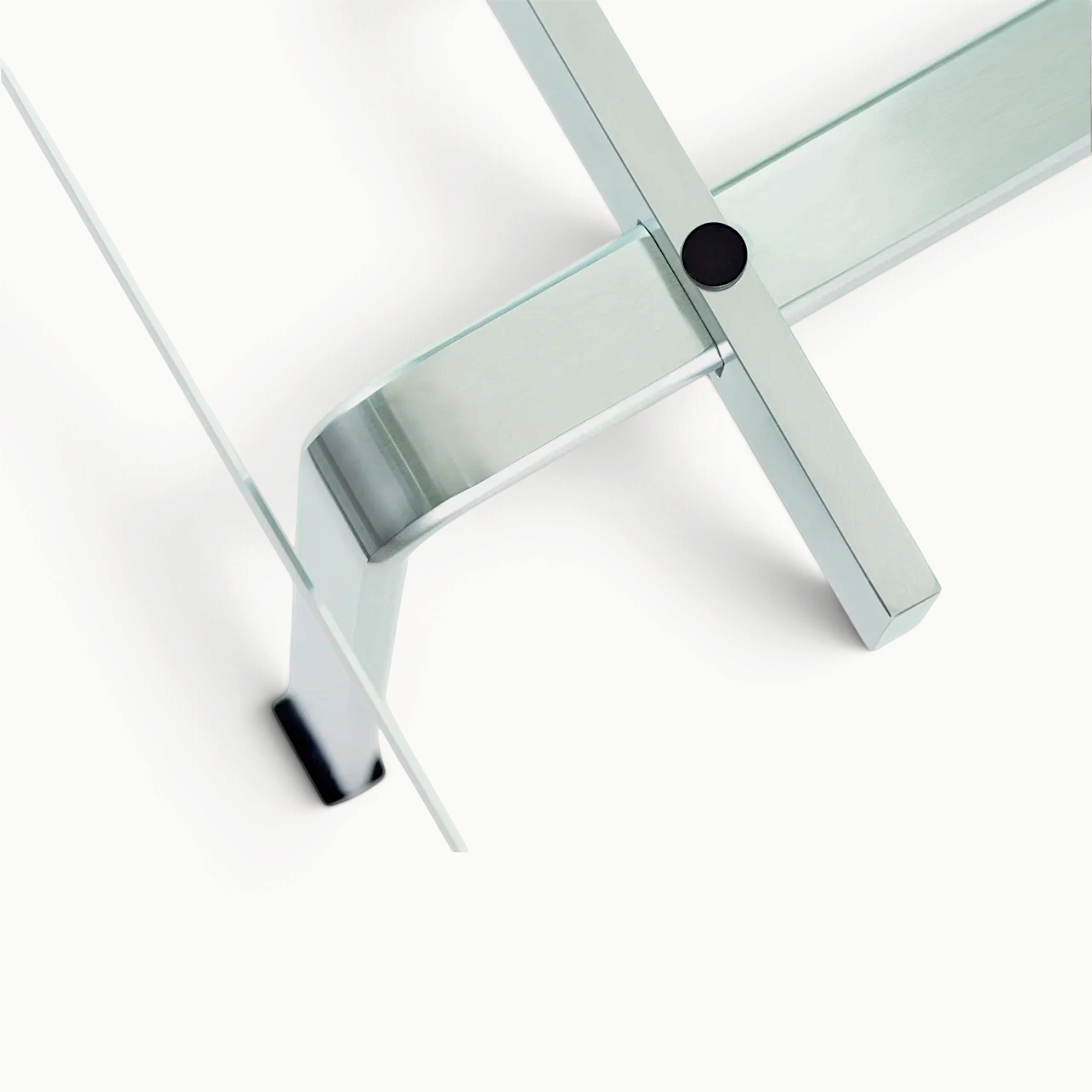 hibino FK89 coffee table featuring a minimalist brushed chrome steel frame and a clear glass top, top-down view