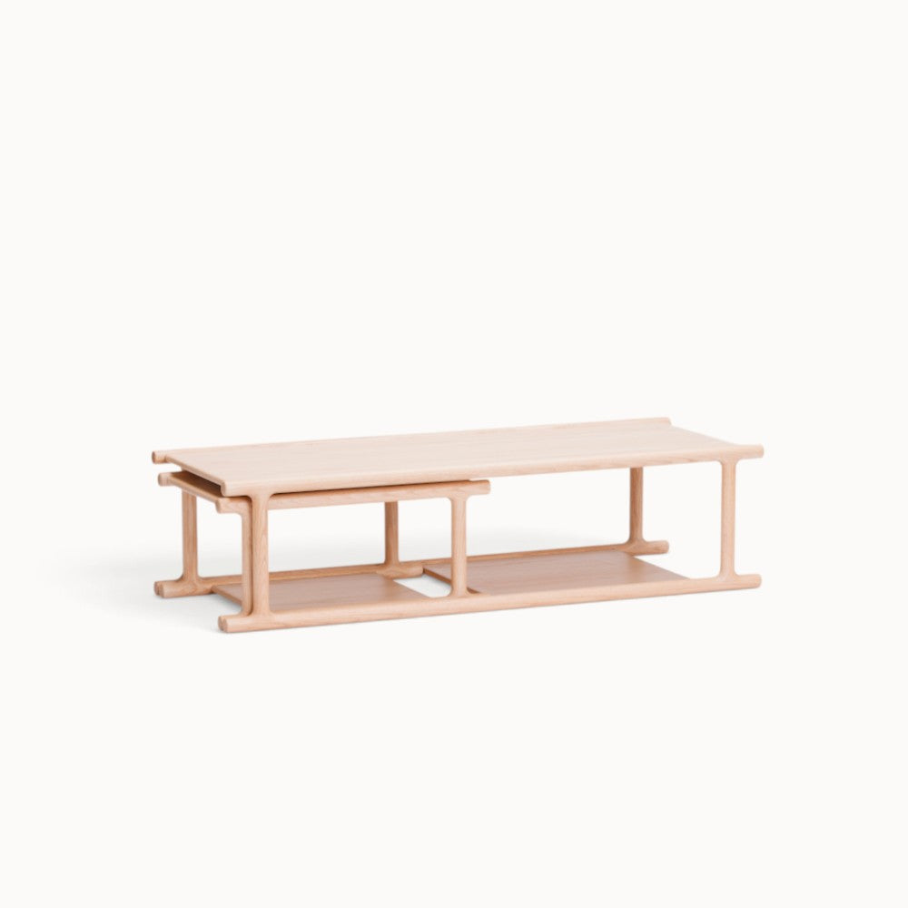 hibino Futago nesting coffee table set in light natural wood with integrated lower shelves for storage