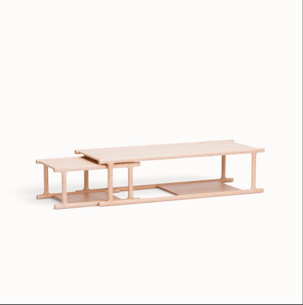hibino Futago nesting coffee table set in light natural wood with integrated lower shelves for storage