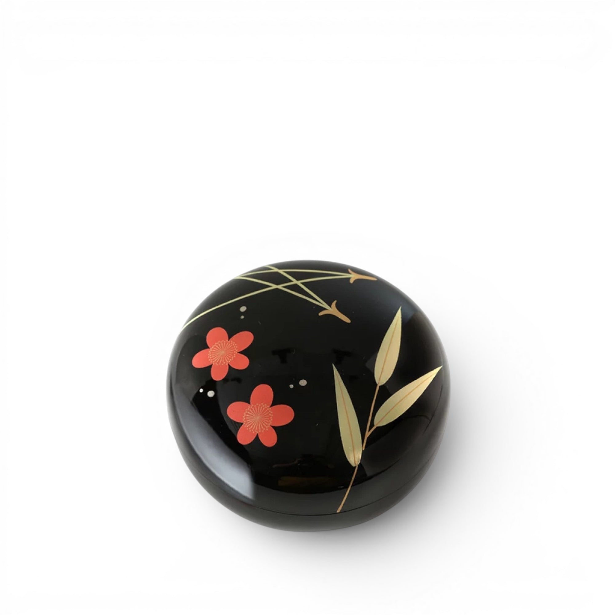 hibino round black Japanese lacquer box featuring traditional pine, bamboo, and plum blossom motifs in gold and red