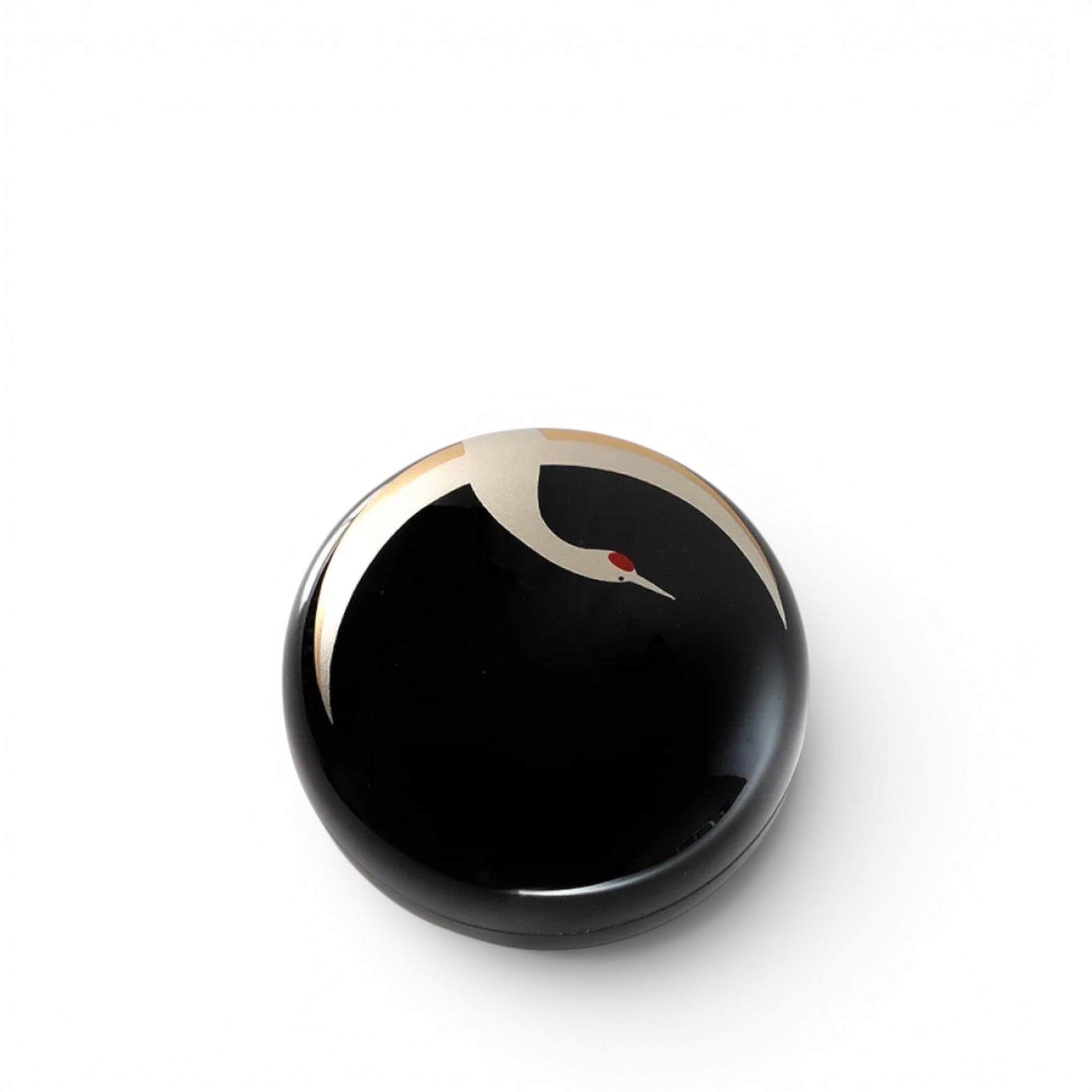 hibino round black Japanese Urushi lacquer box featuring a gold and white crane motif for longevity and good luck.