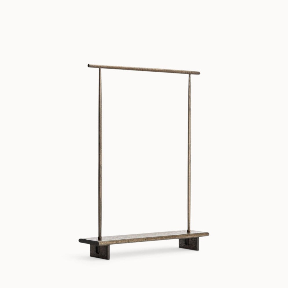 hibino Kata coat stand in dark wood with a minimalist Japanese-inspired design and a sturdy base for storage