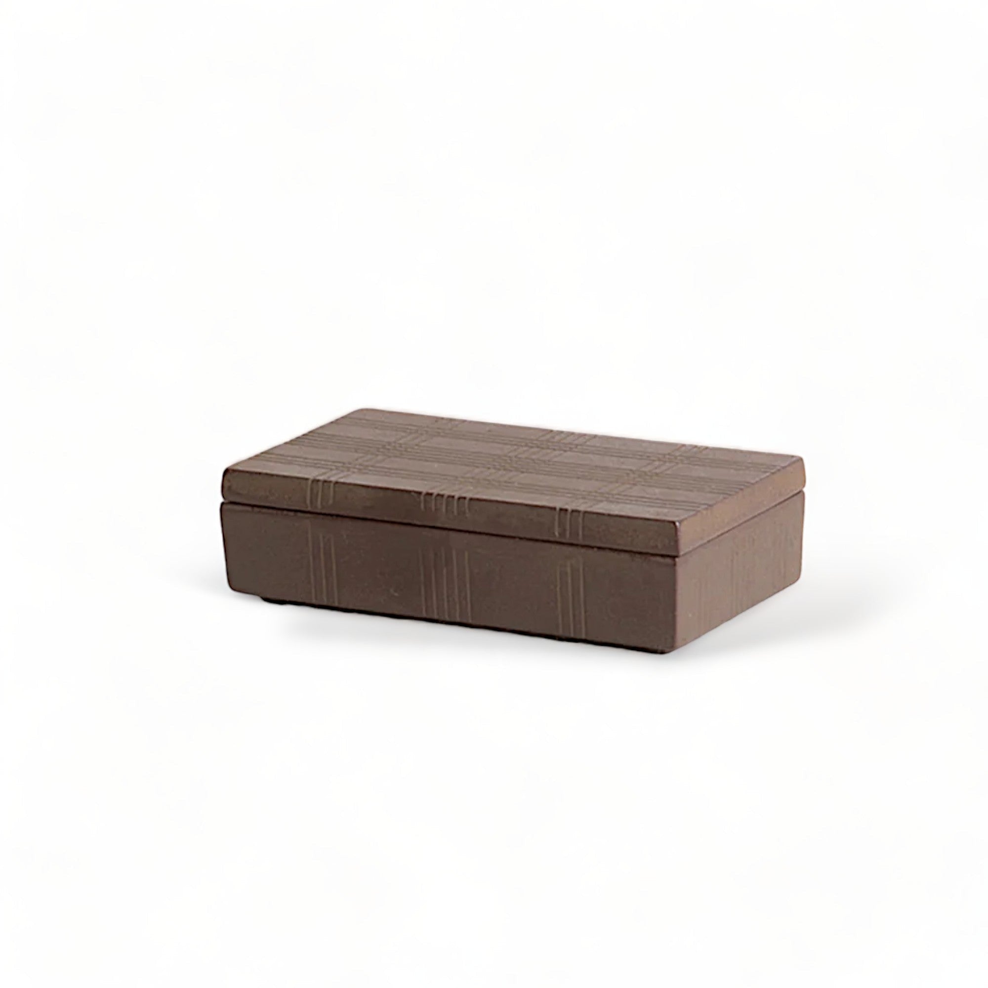 hibino Nambu tekki cast iron box with a textured striped pattern, handcrafted in Iwate, Japan.