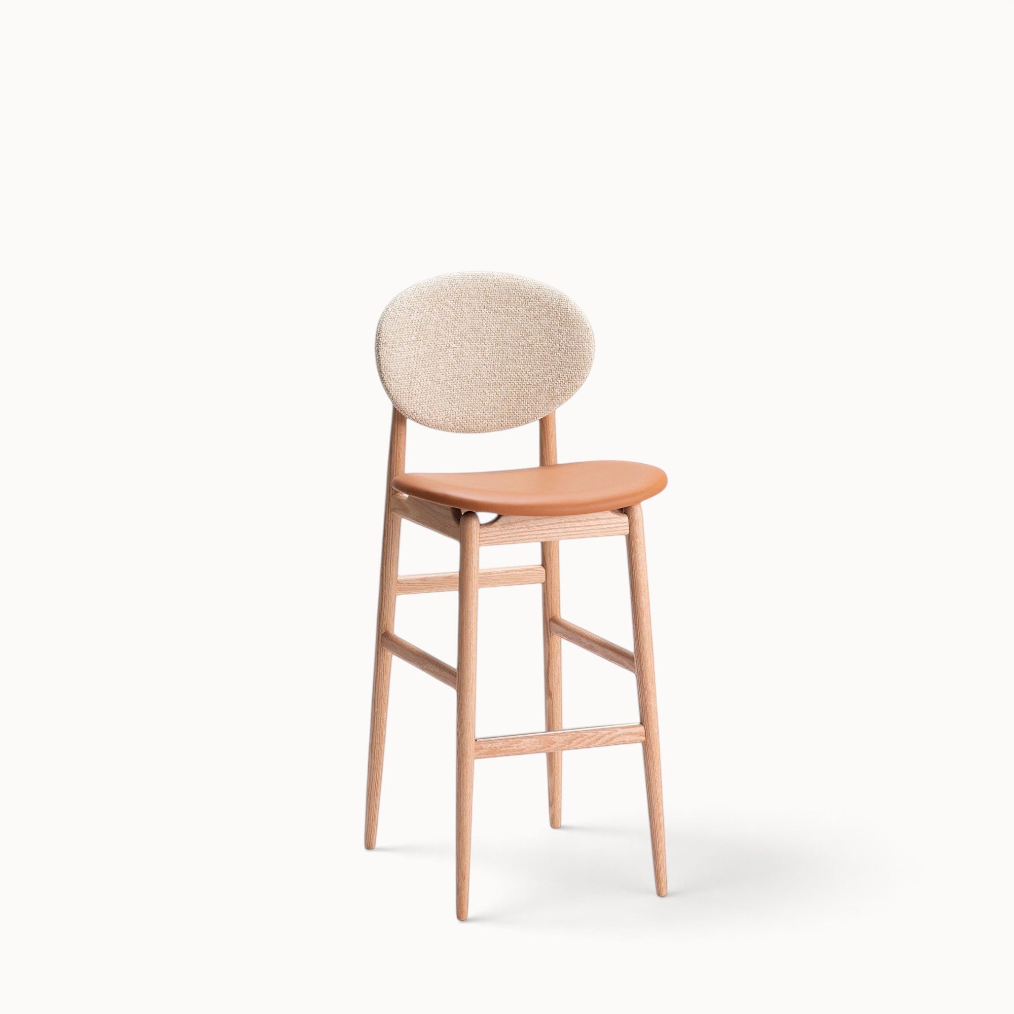 hibino Outline Barstool with a light wood frame, tan leather seat, and a round beige fabric backrest