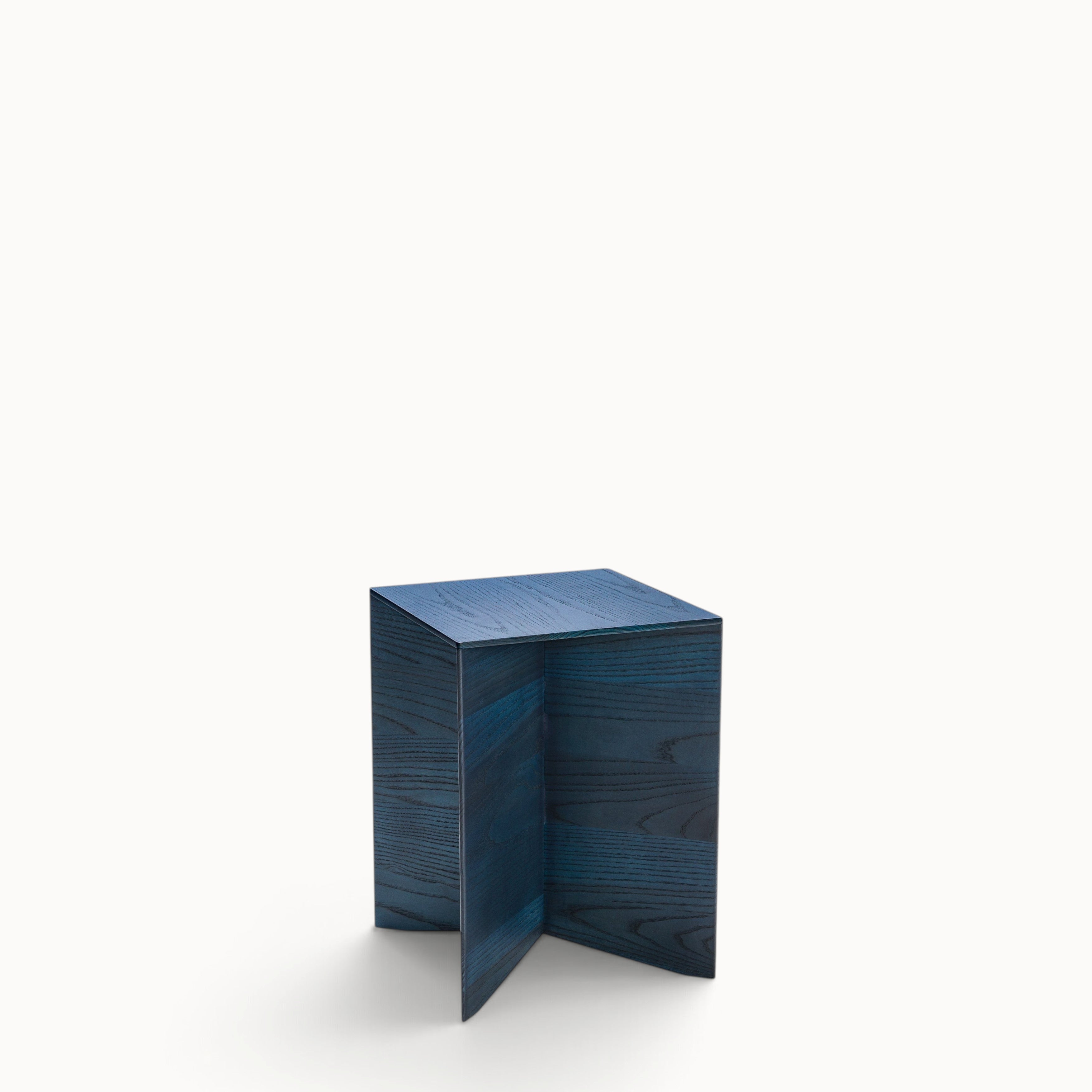 hibino Paperwood side table in dark blue stained wood with a minimalist geometric design on a white background