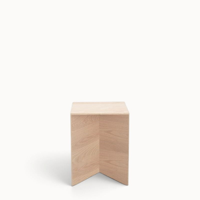 hibino Paperwood side table in natural oak wood with a minimalist V-shaped base design on a white background
