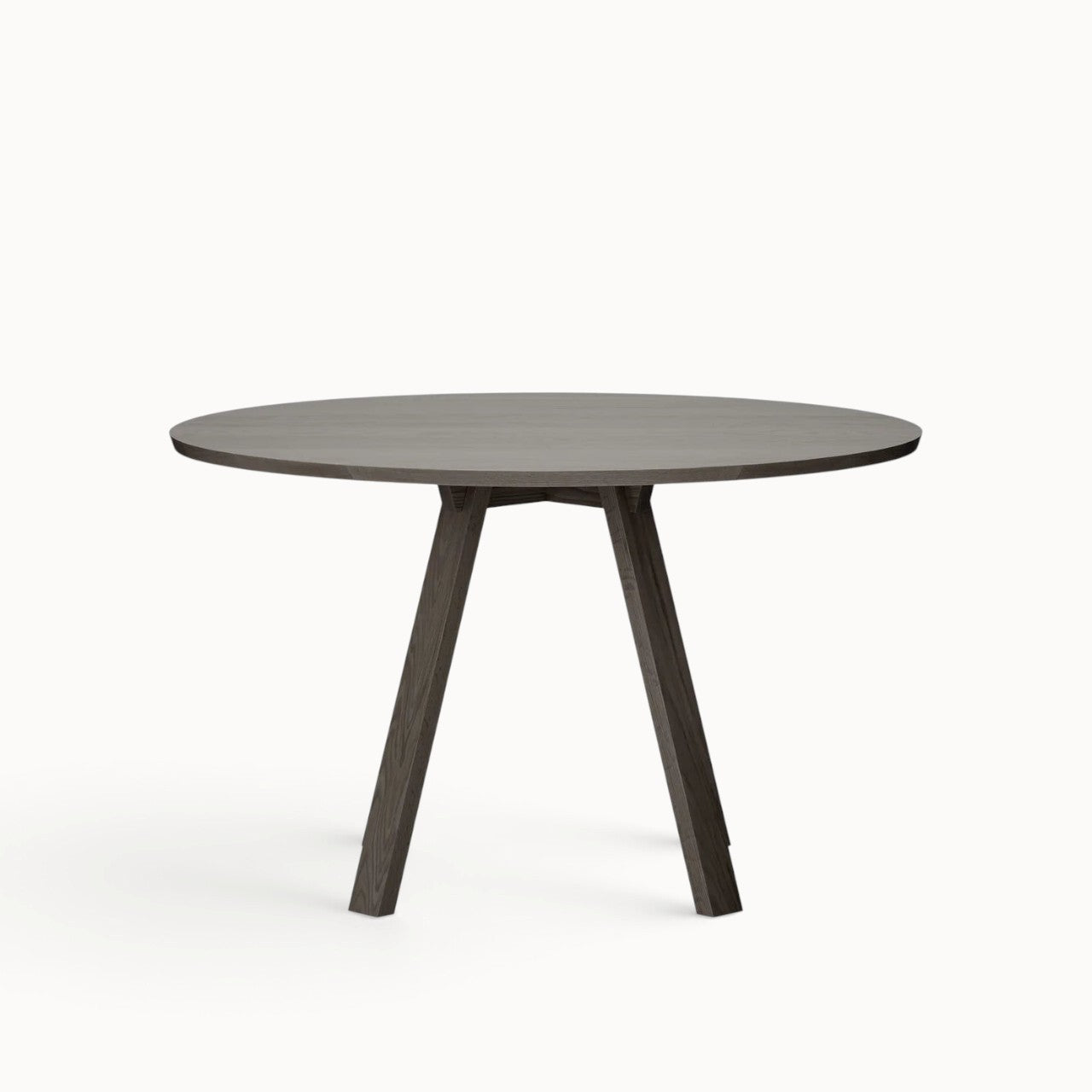 hibino Sagyo round table in dark stained oak with a minimalist design and split tabletop for cable management