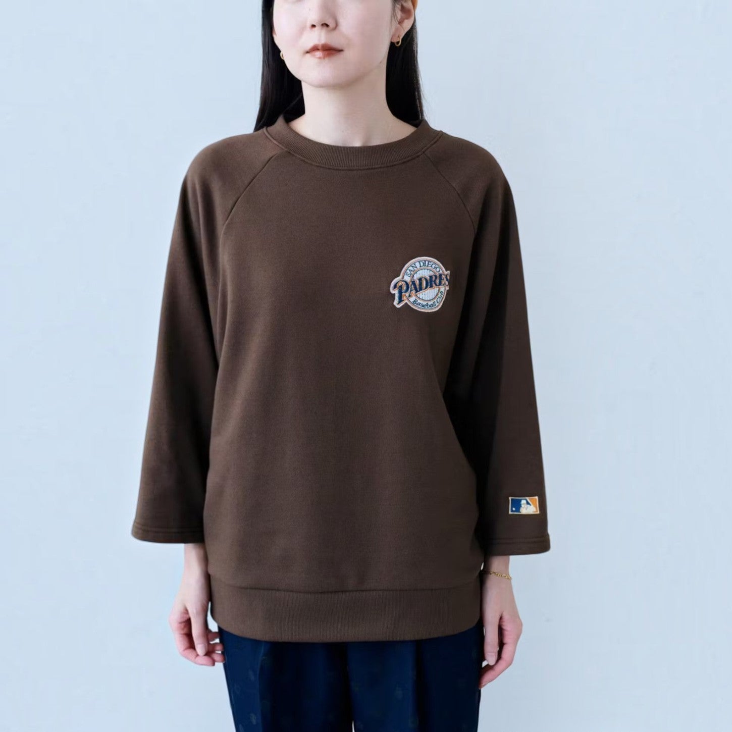 hibino brown San Diego Padres Cooperstown Collection sweatshirt with three-quarter sleeves and vintage chest logo