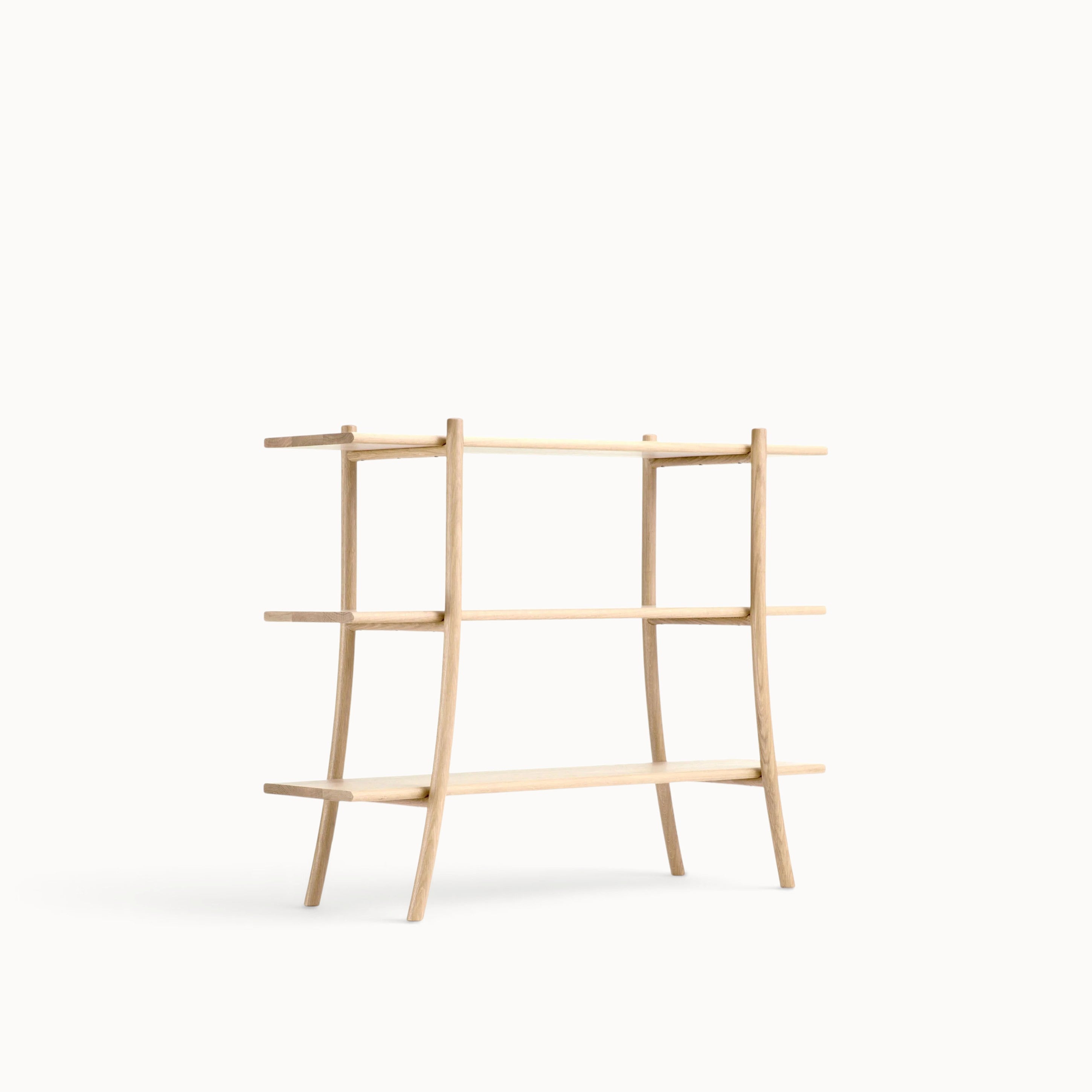 hibino Skyladder shelves in light oak wood with a minimalist ladder-inspired design and curved structural legs
