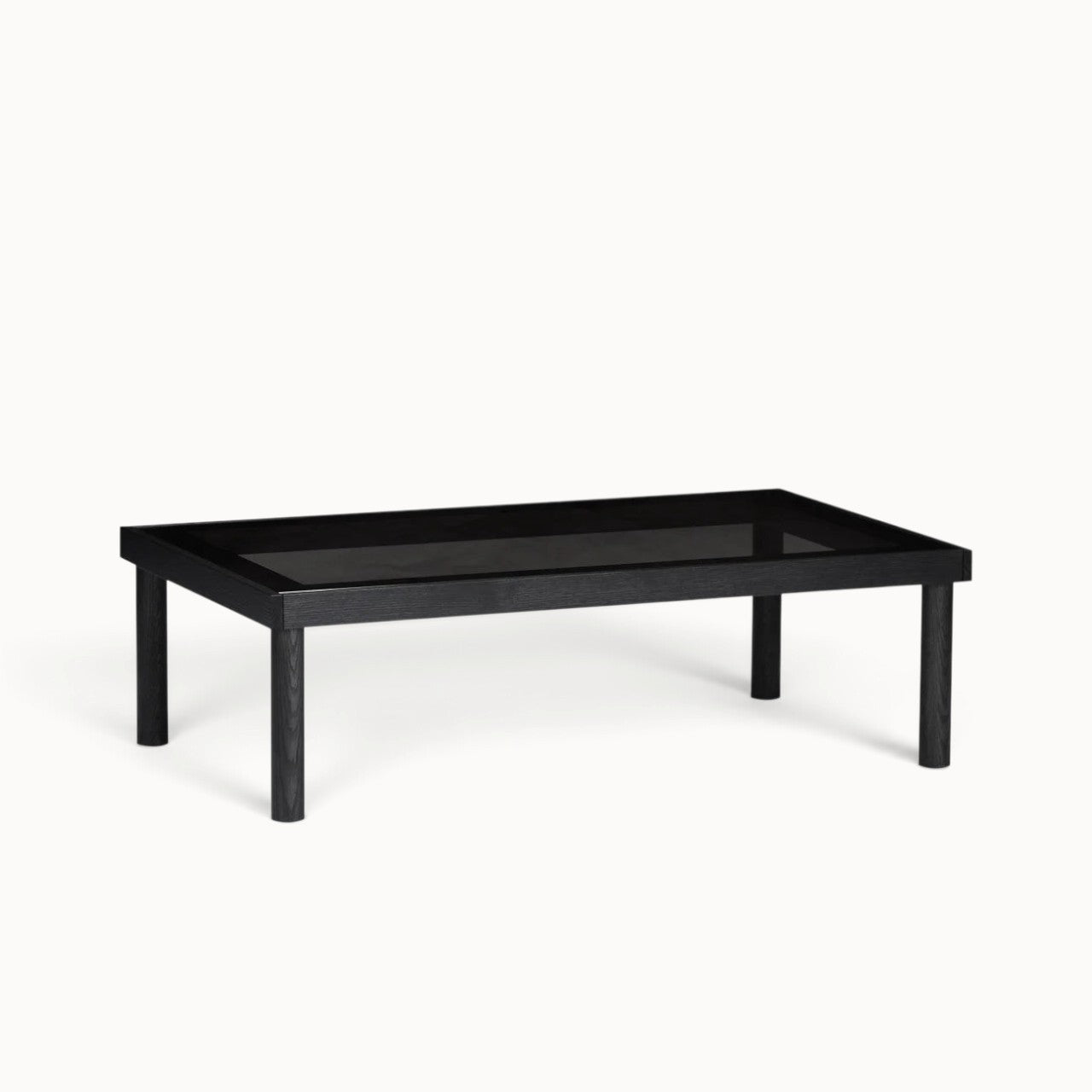 hibino Taruki coffee table with a black wooden frame and a smoked glass top, inspired by Japanese joinery.
