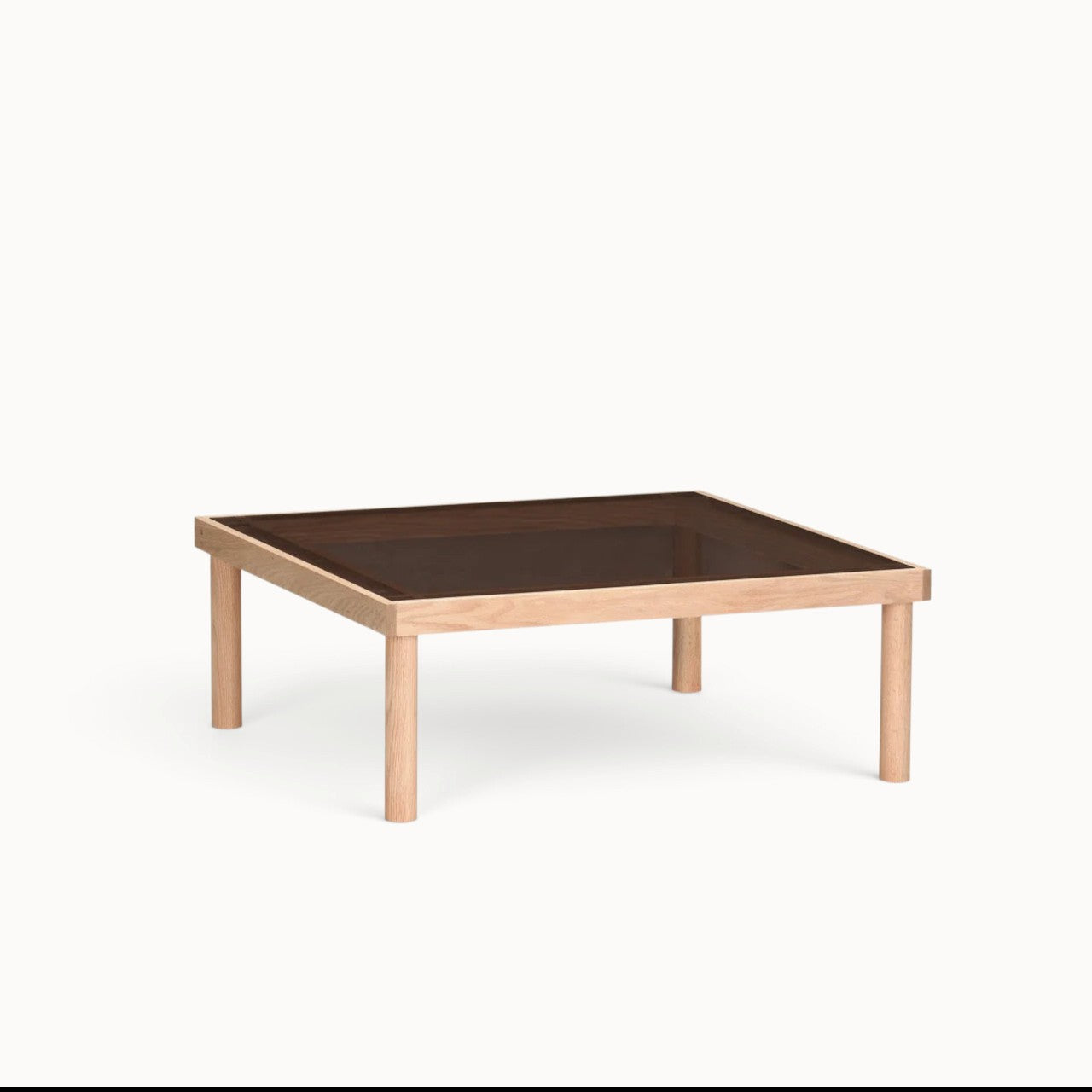 hibino Taruki coffee table with light wood frame and square smoked glass top, inspired by Japanese joinery.