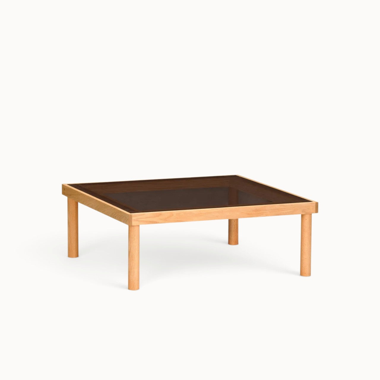 hibino Taruki coffee table with a light wood frame and a square smoked glass top inspired by Japanese joinery