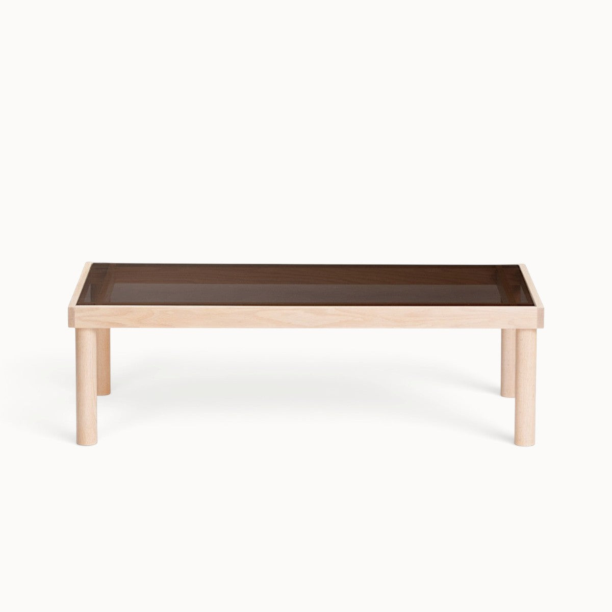 hibino Taruki coffee table featuring a light wood frame with traditional joinery and a smoked glass top