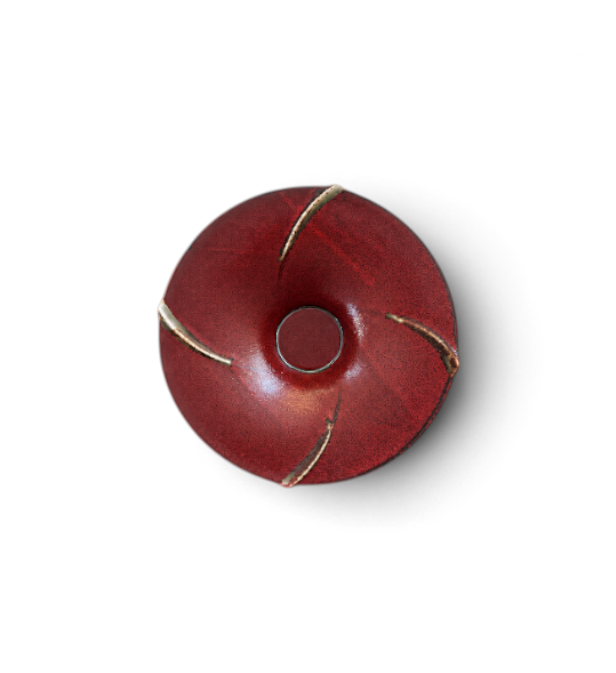 hibino rust red glazed ceramic bowl with a sculptural petal-like shape and textured asymmetrical rim