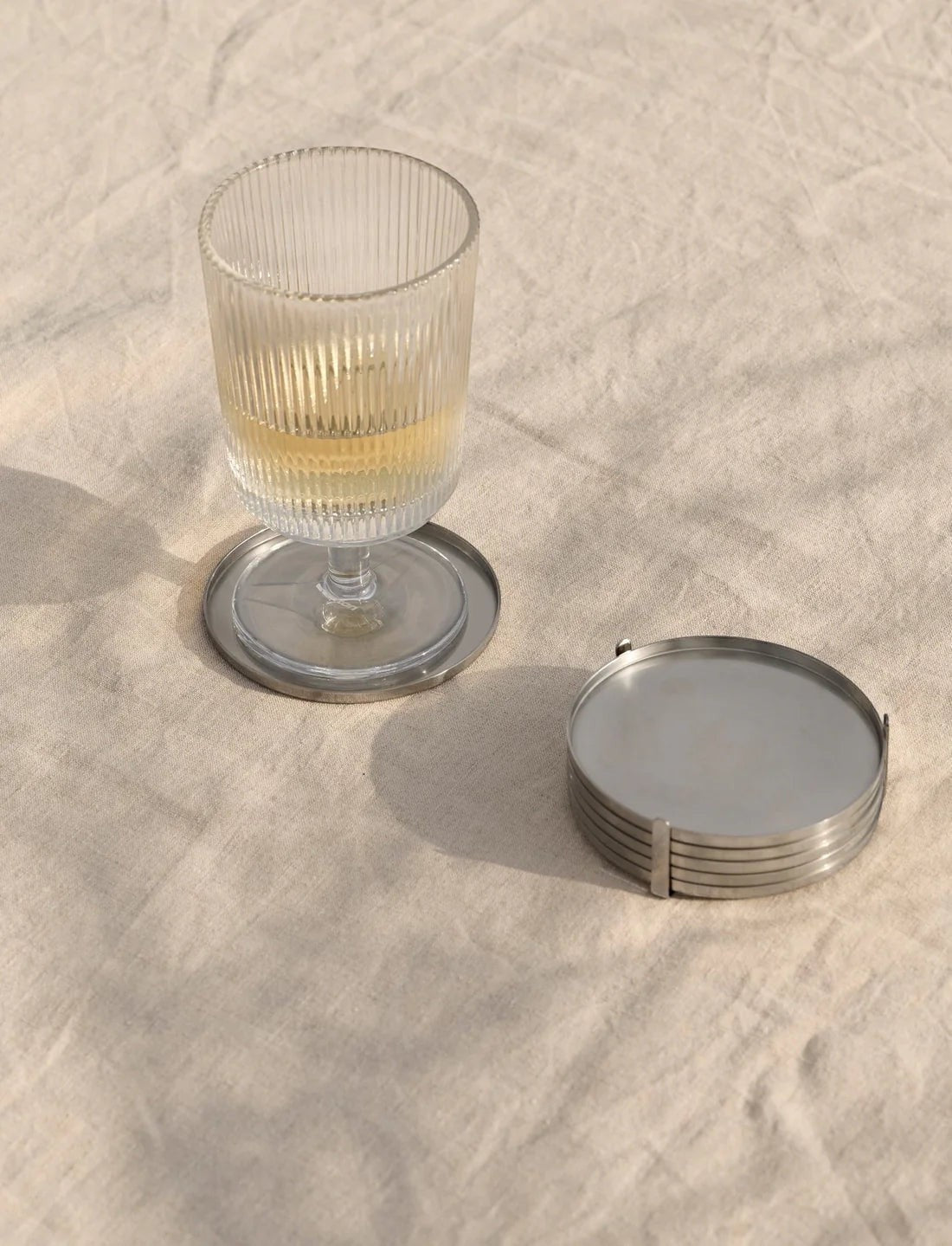 סט תחתיות נירוסטה לכוס של Arne Jacobsen